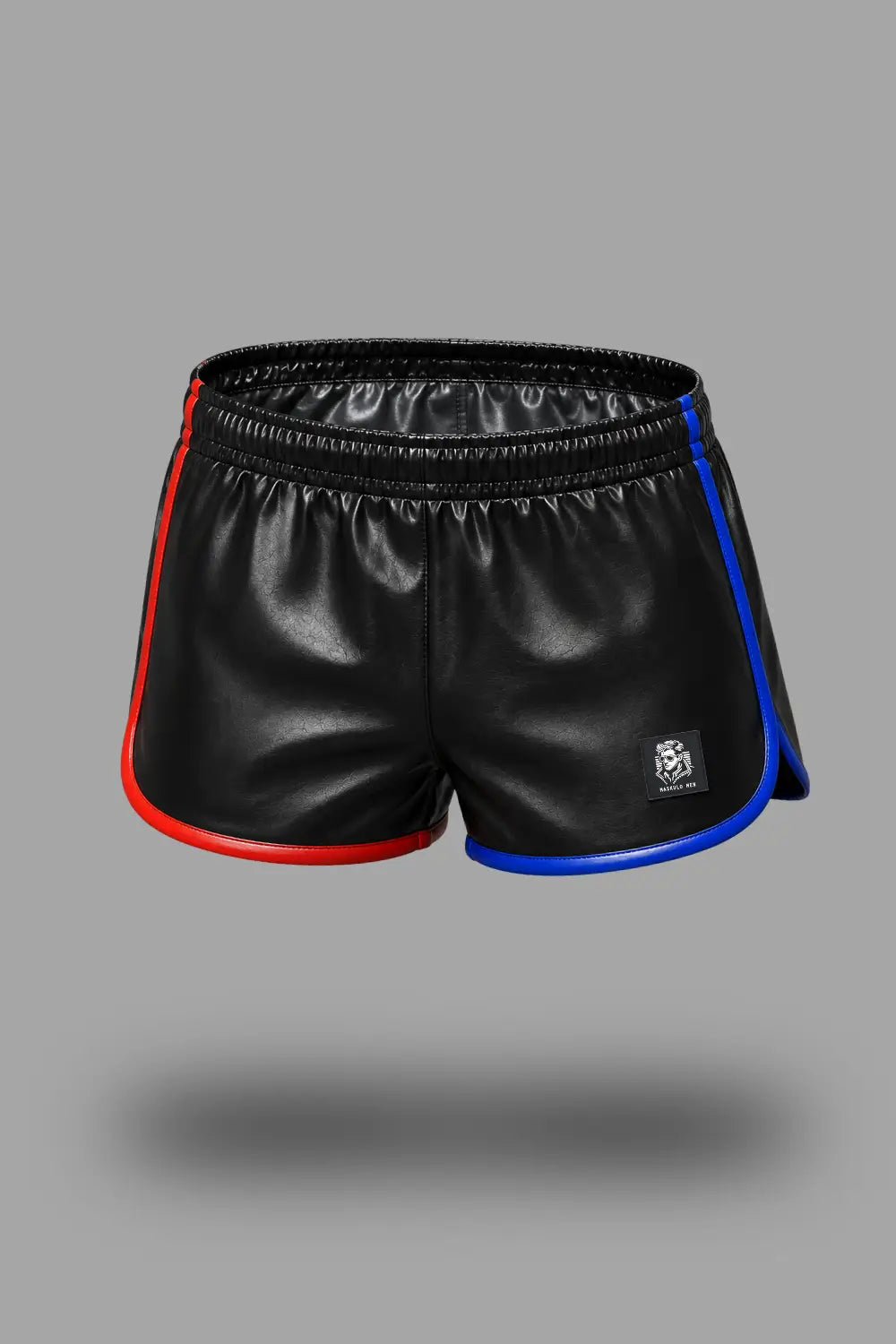 Black athletic shorts with red and blue side piping, featuring a small white logo on the lower left leg, shown against a solid gray background. Axel GoDuo Shorts. Red + Blue. Jogging styled PU Leather Shorts MSH275 - 1 Maskulo EU Global Online Store