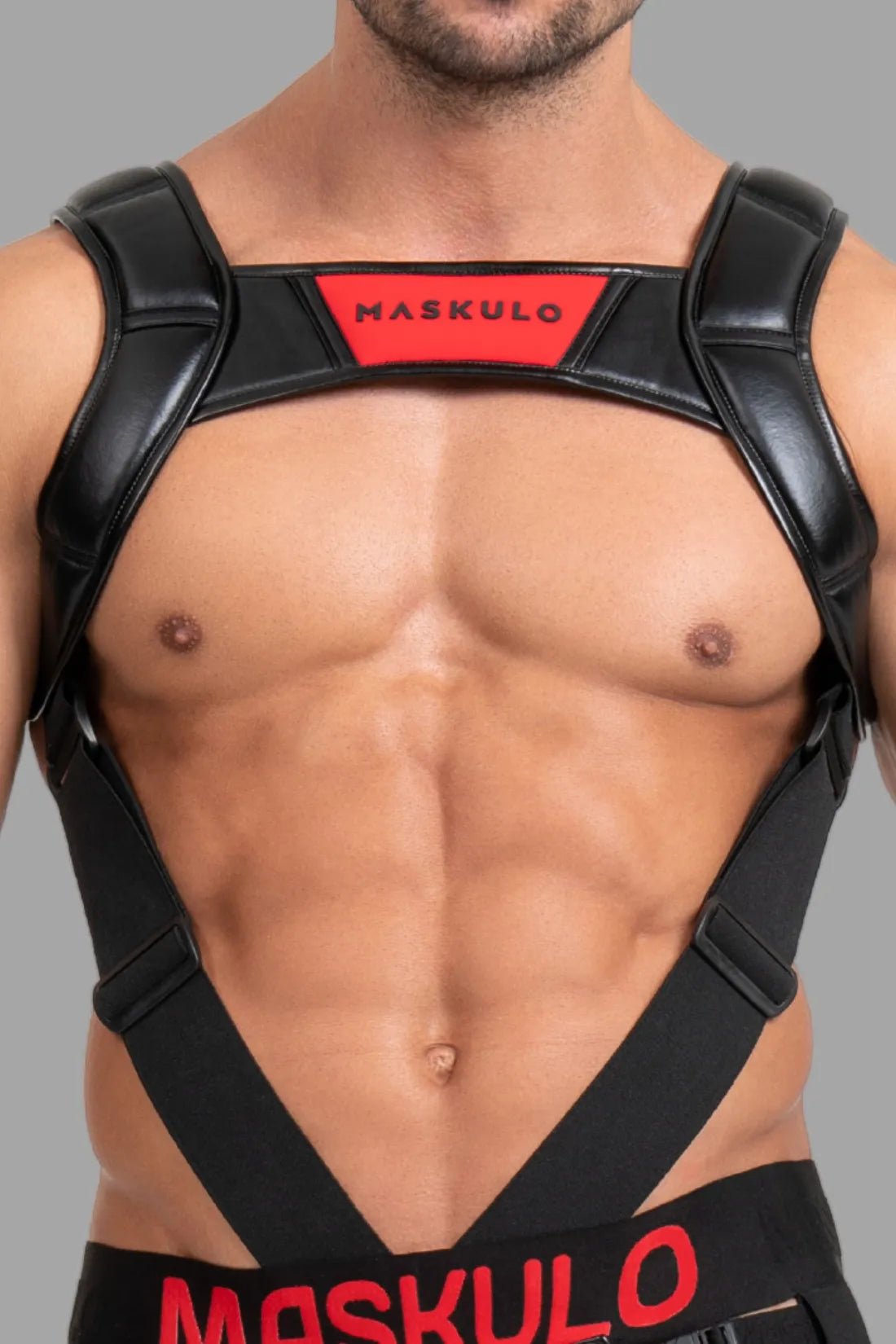 Maskulo Global (EU) Body Harness in black and red with push-up effect. High-quality accessory for comfort and style. Available in EU.