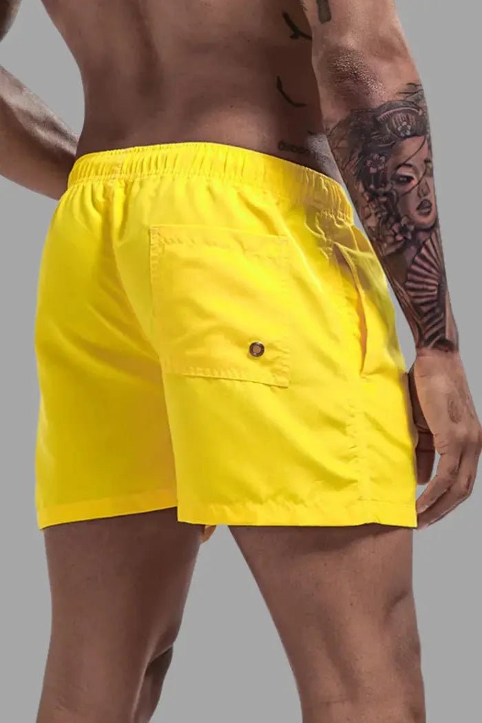 Maskulo Triton Cyclone Soft-Touch Nylon Shorts in yellow. Comfortable, quick-drying shorts with mesh lining and 3 pockets. MSH243.