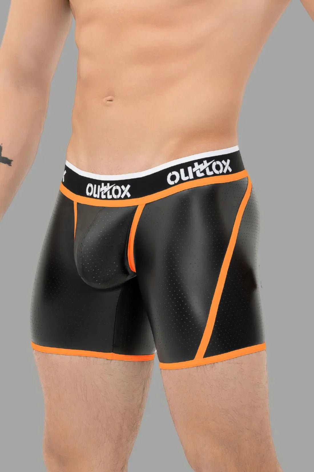 Outtox Wrap-Rear Short Tights with Snap Codpiece in Black & Orange by Maskulo. Tight-fit shorts, perforated material.