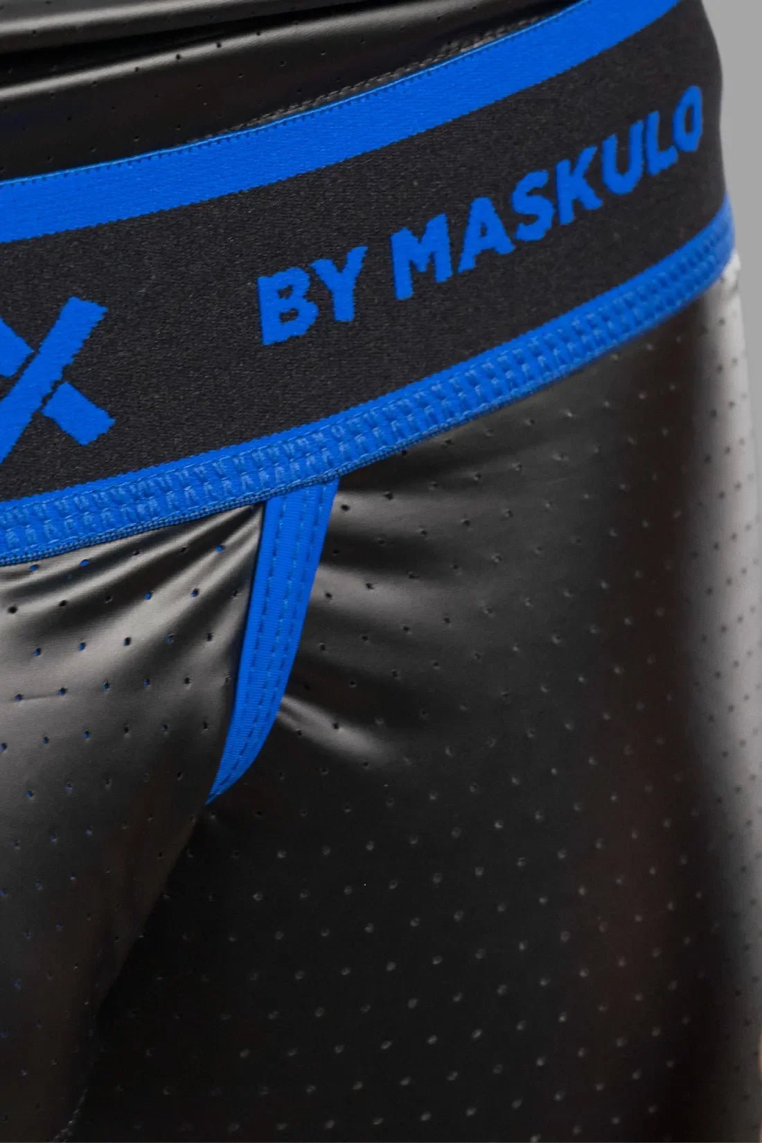 Outtox by Maskulo Wrapped Rear Shorts in black and blue, featuring a snap codpiece and perforated PU eco leather material.