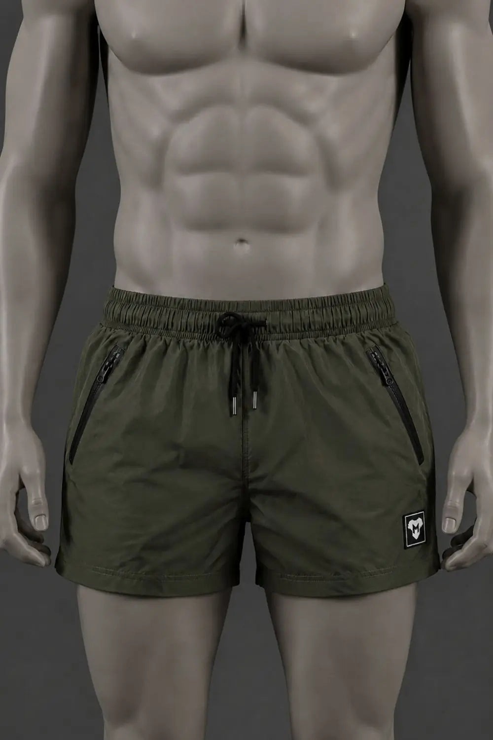 Short Jedd Synther Soft avec poches zippées. Vert kaki