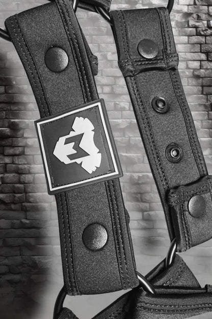 Jaxon Hexguard black neoprene body harness by Maskulo with adjustable snap buttons, removable cock ring, and metal ring.