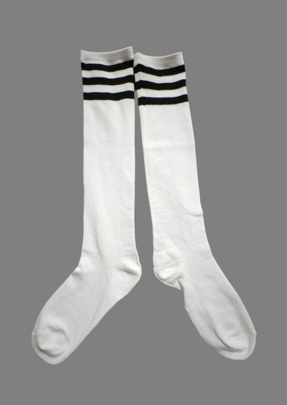 Maskulo Long Socks: White with Black Stripes. Polyester and cotton blend, stretchy, 45cm total length. Ideal for football and running.