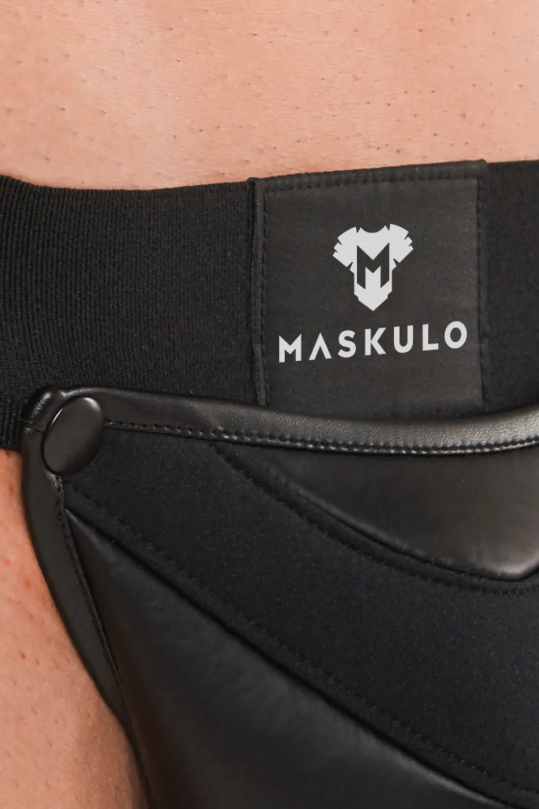 Maskulo Armored Next Black Jockstrap: sleek polyester/polyurethane blend underwear with detachable pouch and bold graphical cut lines.