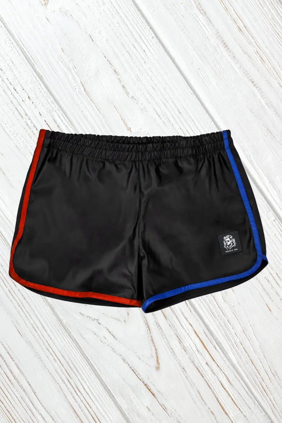 Maskulo Luis Powern running style PU leather-look shorts in black with red and blue side stripes, featuring a front zipper pocket.