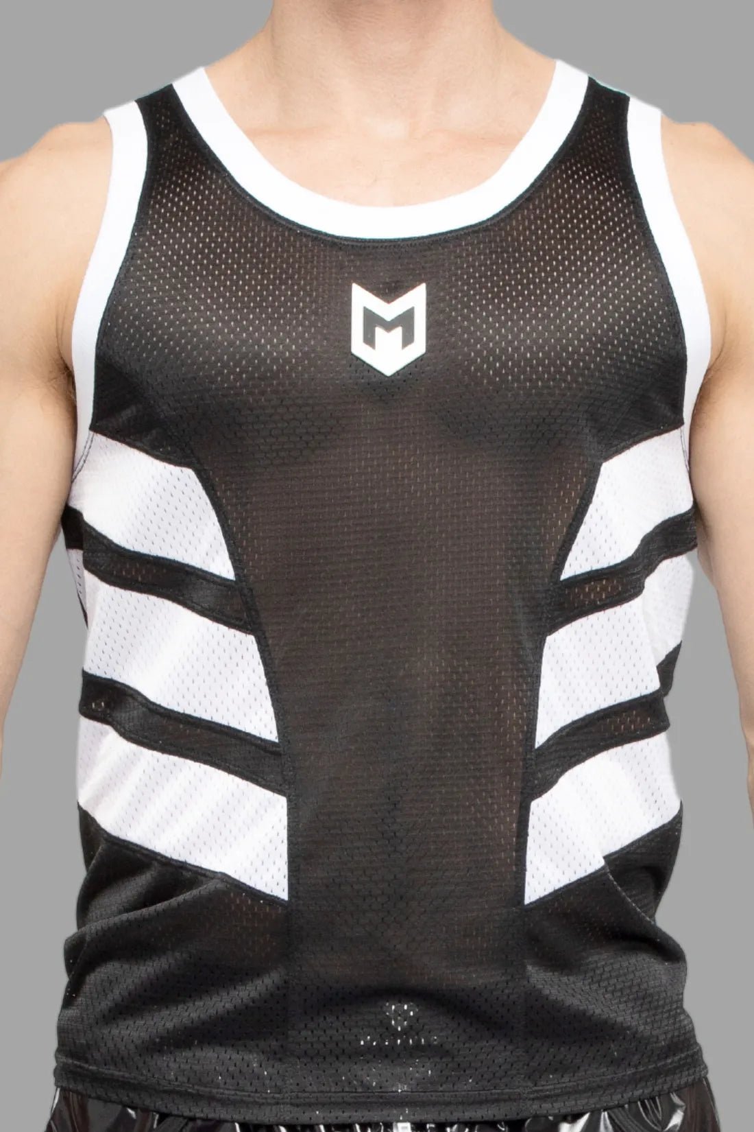 Maskulo Skulla mesh tank top in black and white polyester, soft, breathable, with contrastive side elements and a PVC letter M on the chest.