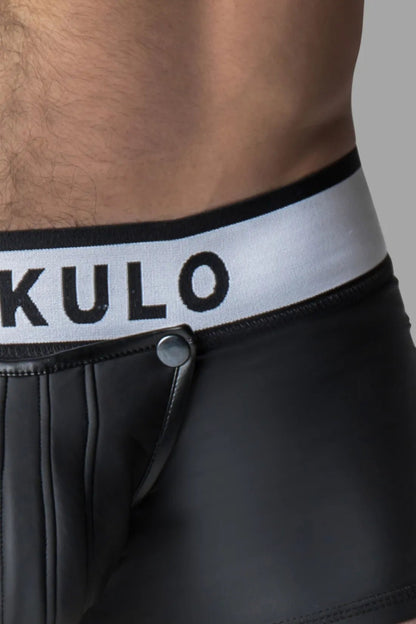 Maskulo rubber look trunk shorts in black for men, featuring a detachable pouch and an open rear. Made of polyester, polyurethane, and elastane.