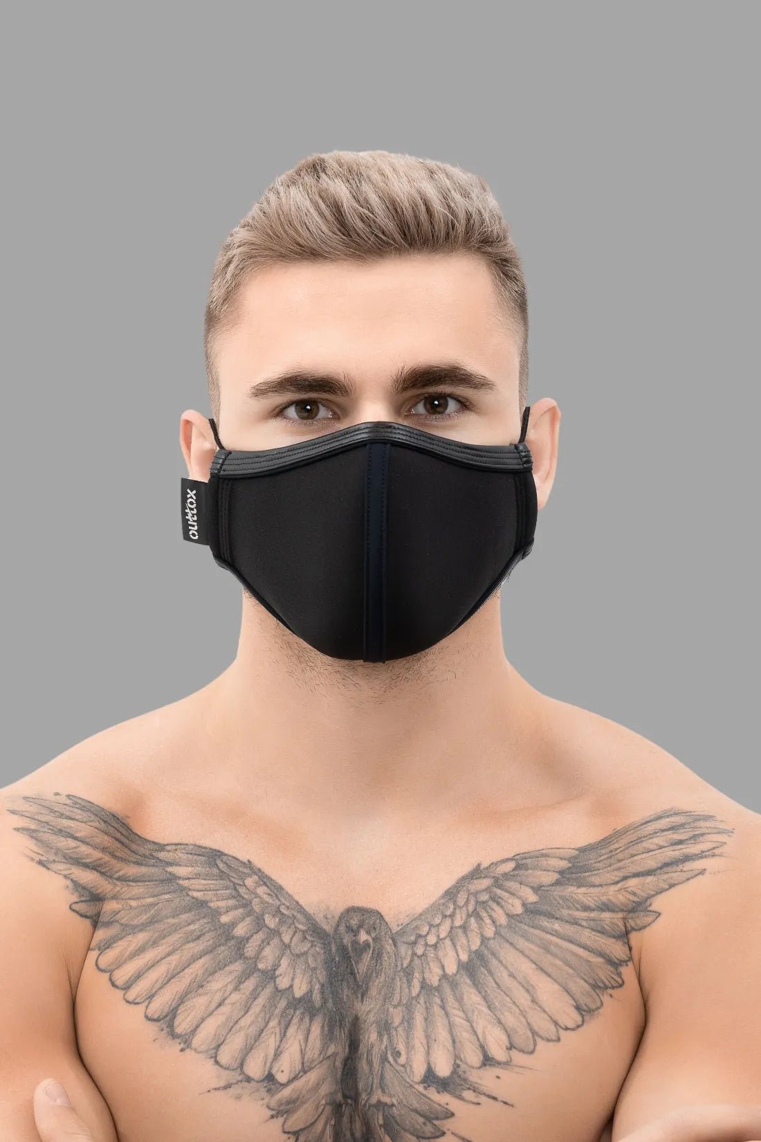 Outtox Everyday Mask Black: Neoprene, polyester 95%/elastane 5% blend, comfortable, adjustable ear straps, fashion face mask accessory.