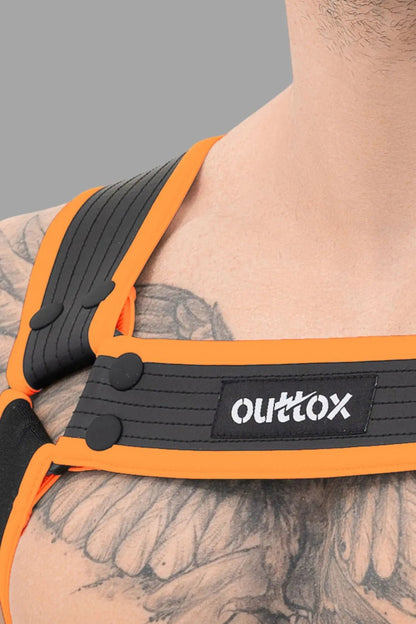 Outtox Body Harness with Snaps in Black and Orange. Leather-look adjustable accessory from Maskulo for a striking look.