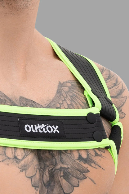 Outtox Body Harness with Snaps in Black and Neon Green from Maskulo, polyester-blend with integrated cockring for comfortable fit.