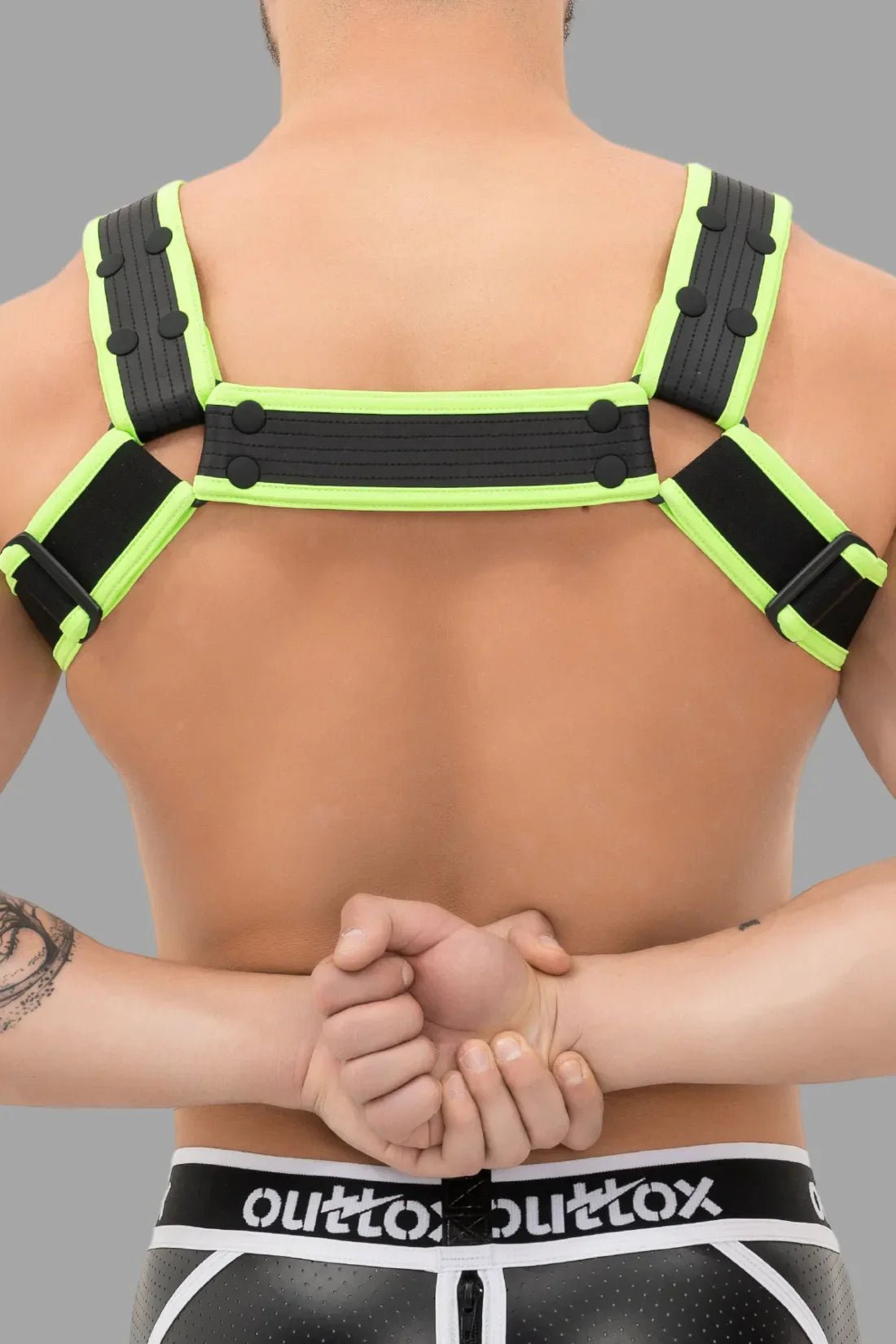 Outtox by Maskulo Black &amp; Green Neon Body Harness with snaps. Polyester/polyurethane/elastane blend, comfortable fit.