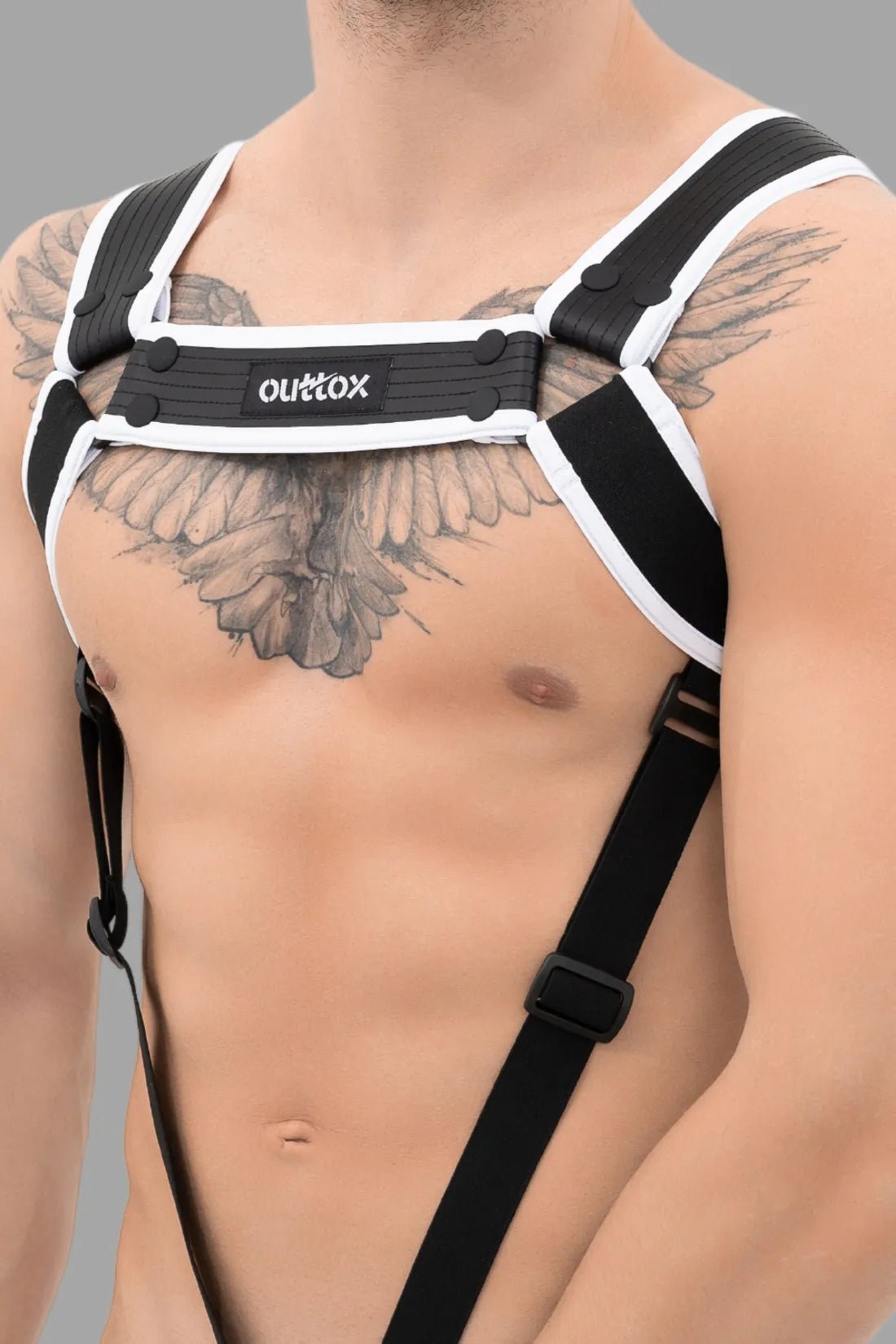 Outtox Body Harness with Snaps in Black and White from Maskulo Global (EU) online Store. Stylish accessory for an edgy look.