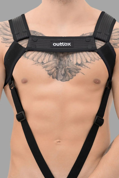 Outtox Black Harness with Snaps by Maskulo. Polyester/polyurethane/elastane blend, adjustable fit, with integrated cockring for enhancement.