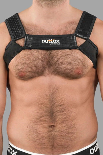 Outtox by Maskulo black bulldog harness with snaps. Polyester/polyurethane/elastane blend, muscle-fit, fetish-inspired design.