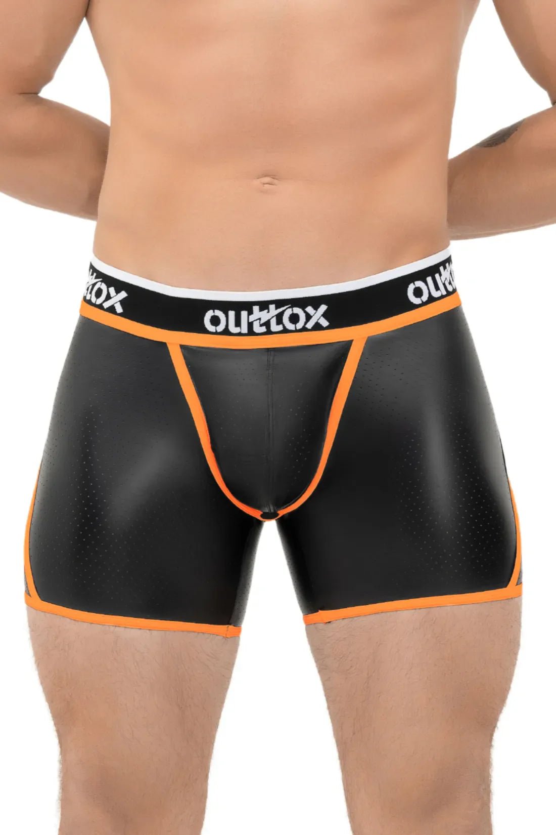 Outtox Open Rear Shorts in black and neon orange. Polyester, polyurethane, and elastane blend with perforated PU eco-leather and snap codpiece.