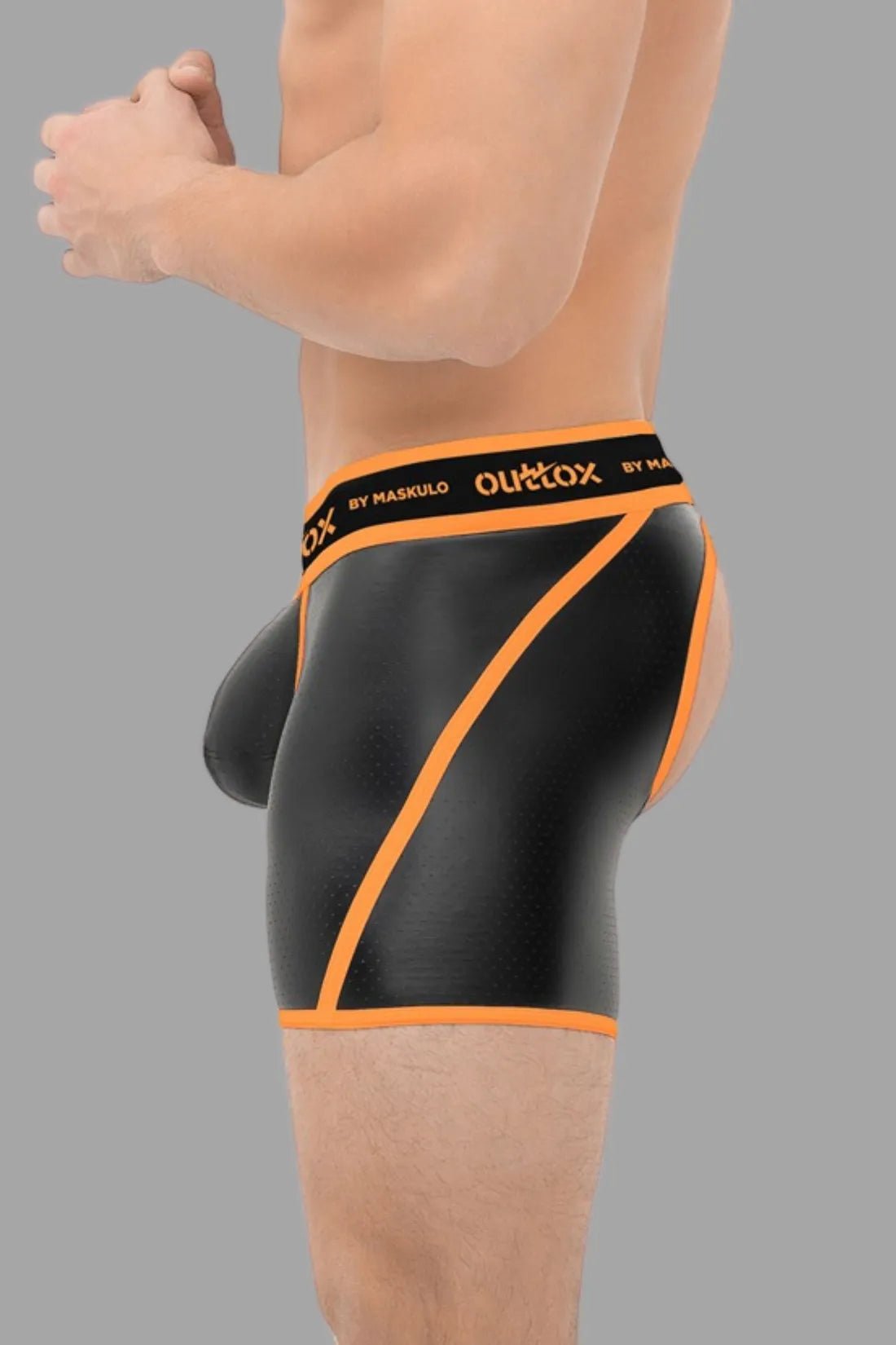 Orange Outtox by Maskulo Open Rear Shorts with Snap Codpiece, offering a provocative look. Perfect for men&