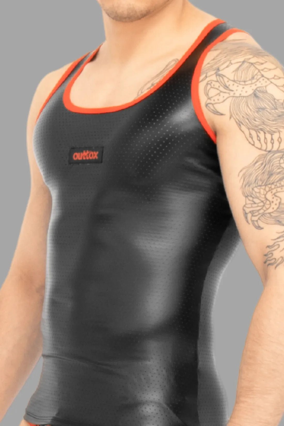 Outtox Black/Red Tank Top. Tight-fit top with perforated PU eco leather and stretch material for comfort. PVC logo on chest.