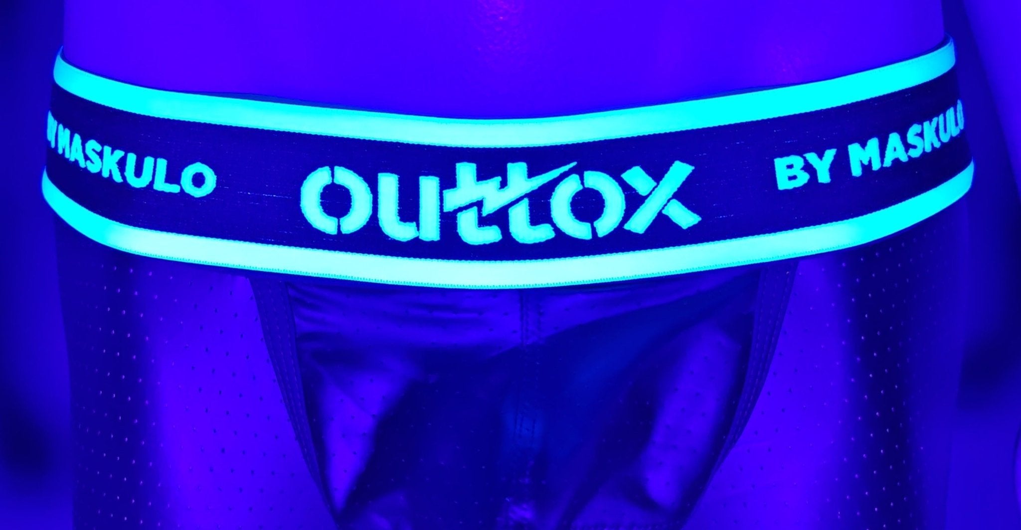 Maskulo Outtox Wrapped Rear Briefs with Snap Codpiece in Black. Fetish leather-look underwear with slotted backwrap for easy access.